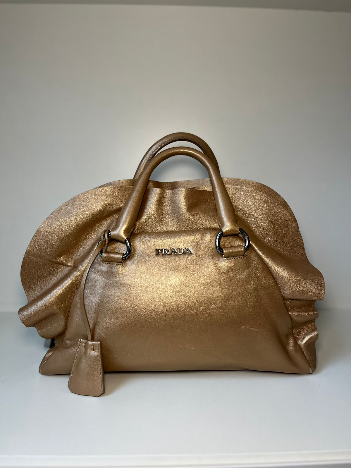 Bolsa Prada Dourada babados