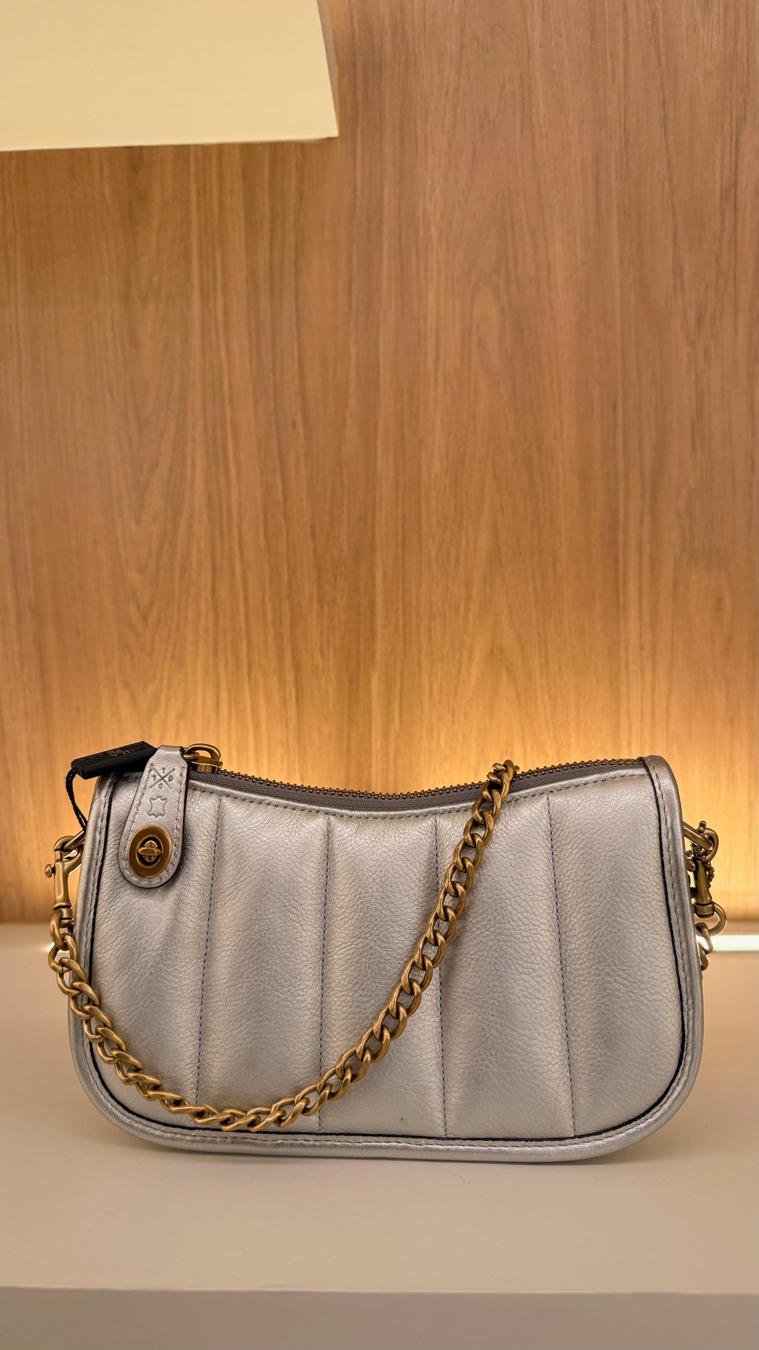 Bolsa Coach Swinger 20 embreagem de couro metálico - Prata