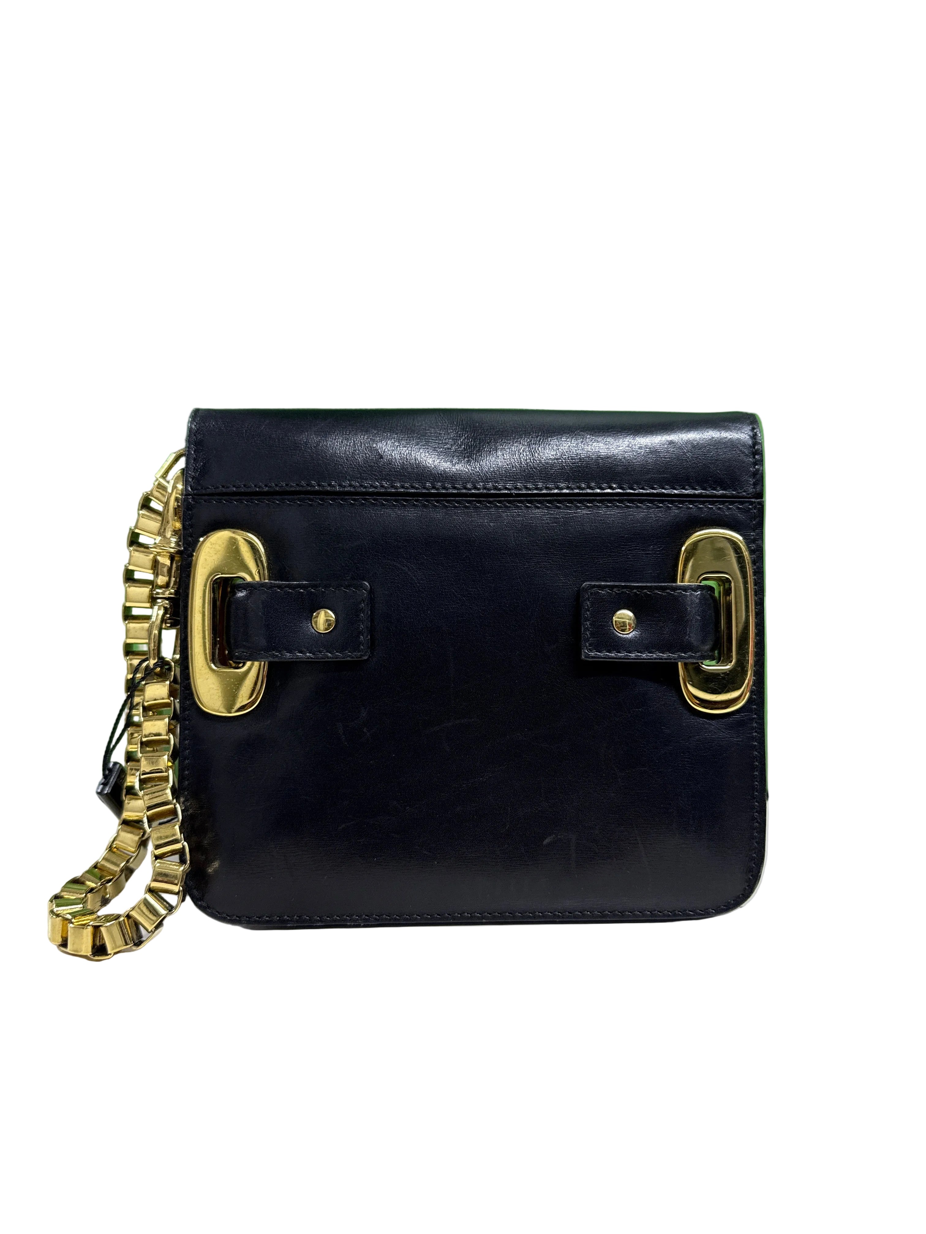 Balenciaga preta com dourado